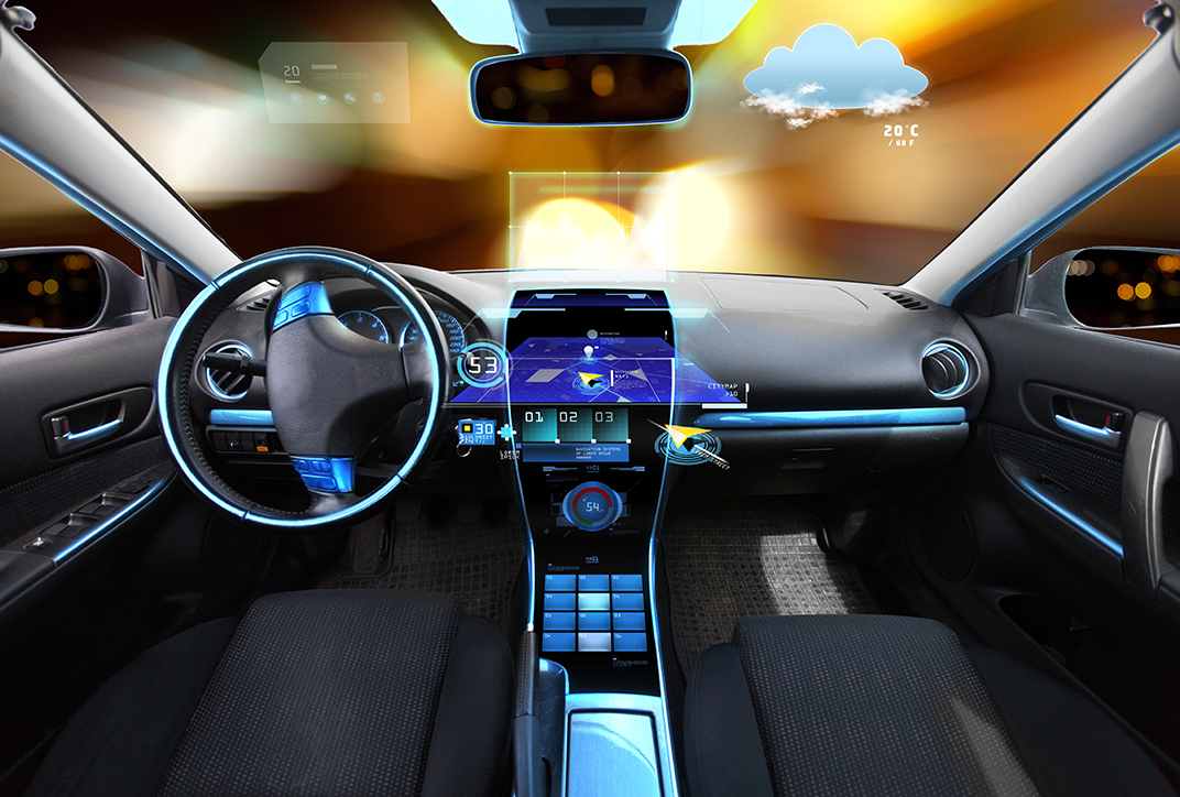 View of the instrument panel in a car showing both the driver’s and the passenger’s side. View of the instrument panel in a car showing both the driver’s and the passenger’s side.