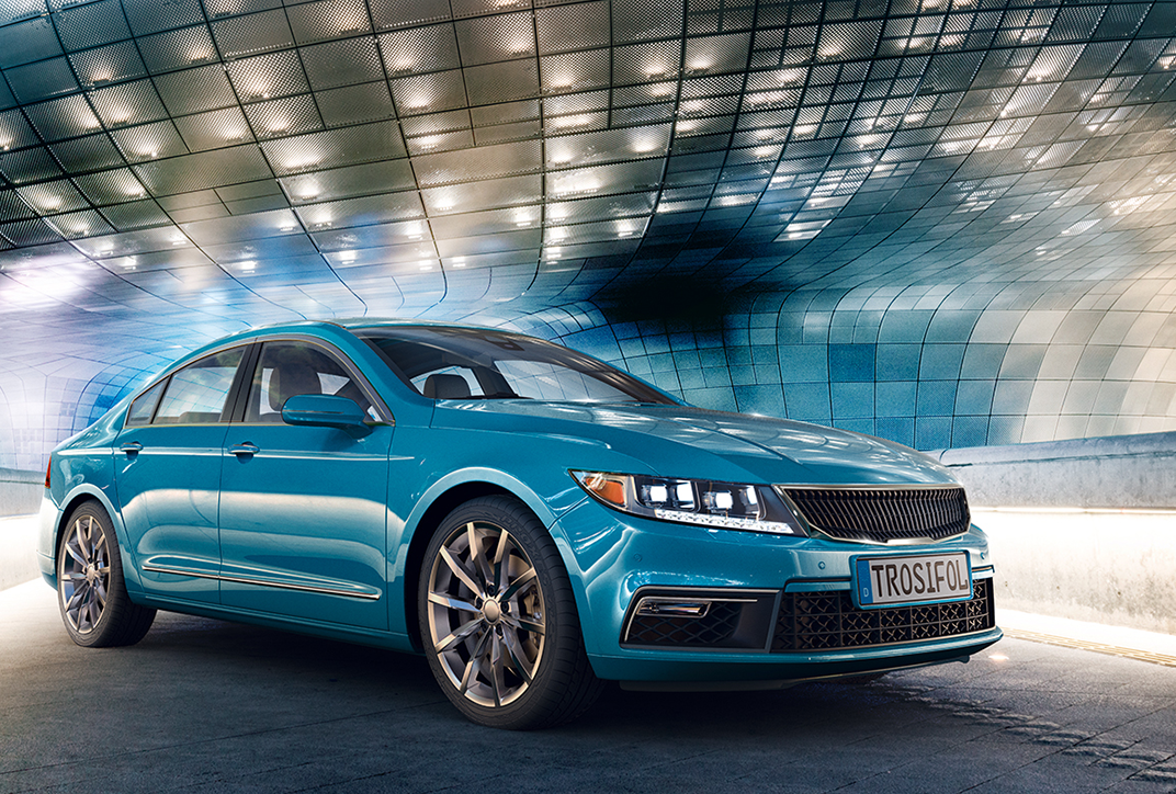 A new or freshly polished car. The bright blue paintwork is gleaming. A new or freshly polished car. The bright blue paintwork is gleaming.