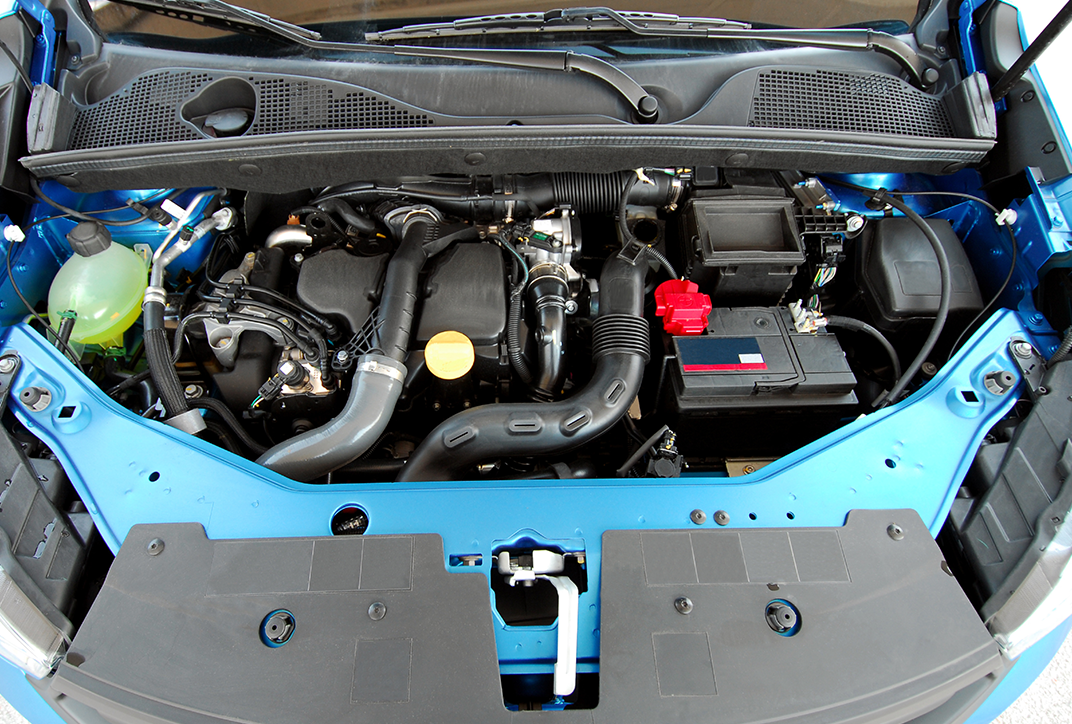 The open hood of a car. The open hood of a car.